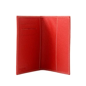 Interior view of cherry red leather passport holder with 3 card slots and a slide pocket, made in Italy