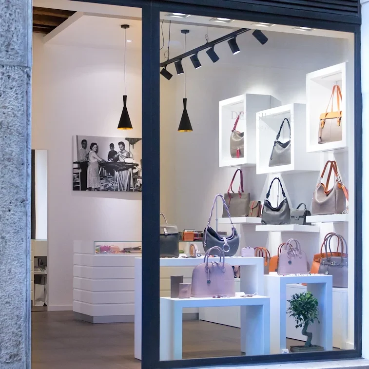 Our leather shop in Rome – Storefront with handmade Italian leather goods on display.